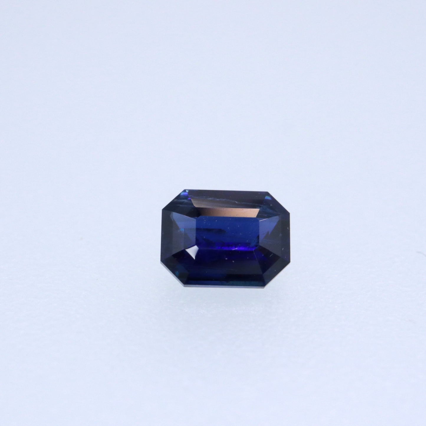 0.64ct blue sapphire emerald cut
