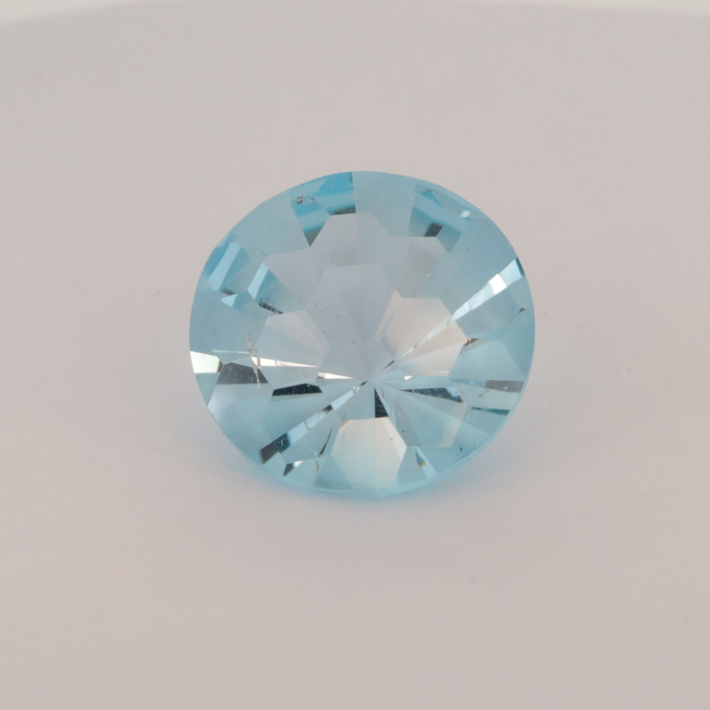 SWISS BLUE TOPAZ 8.77ct fancy cut round