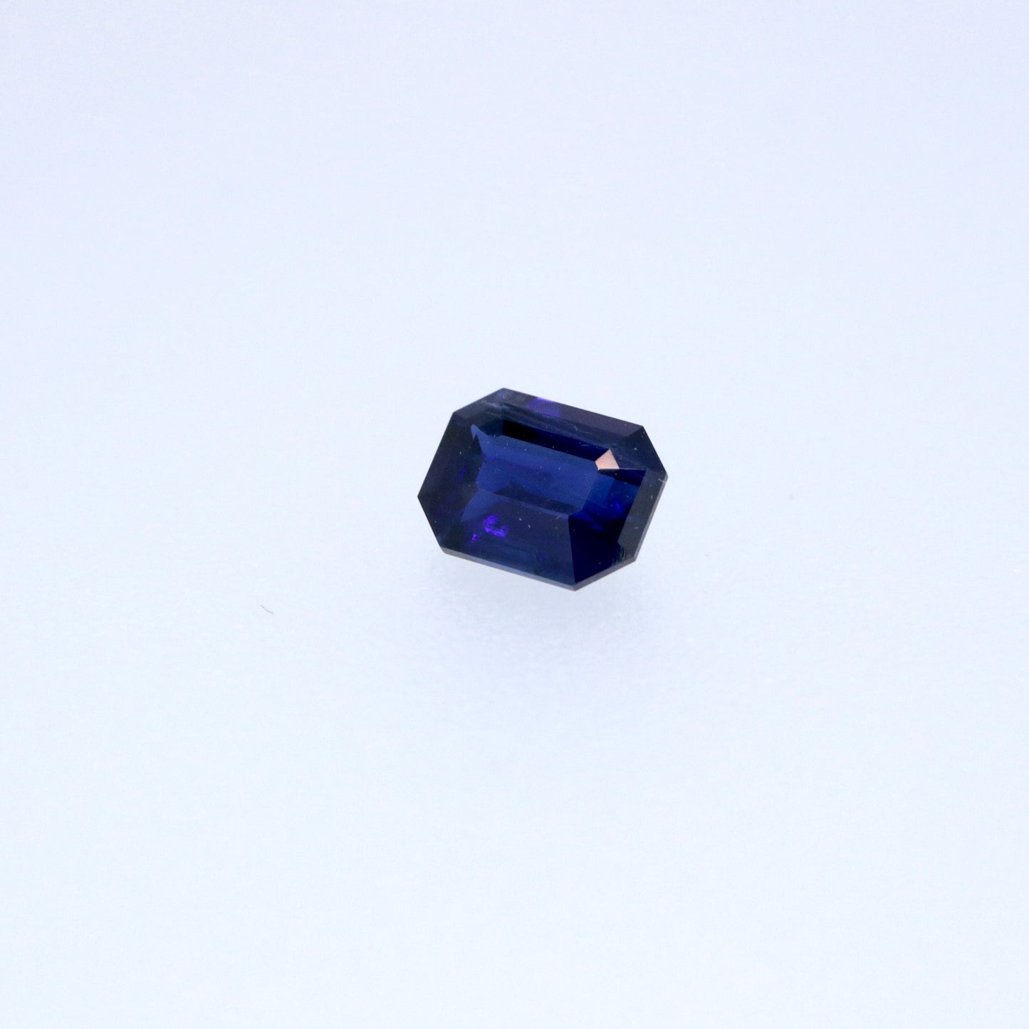 0.64ct  blue sapphire emerald cut